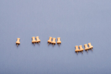 Set of 4 push pins on background