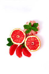 grapefruit with mint, juicy fresh , slices, top view on a white background., vertical  - obrazy, fototapety, plakaty