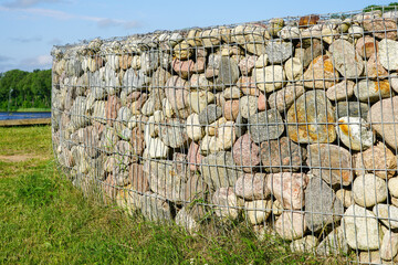 gabion fence wall from steel mesh with stones