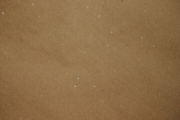 Texture of beige Kraft paper. Old wrapping paper.