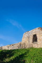 Fototapeta na wymiar Ruins of the castle and blue sky. Fragment, details. Lanckorona, Poland