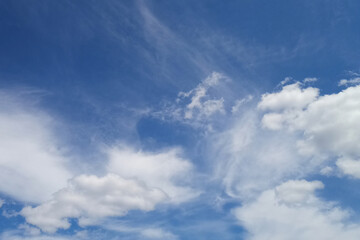 Naklejka na ściany i meble Blue sky with white cloud on a sunny day. Beautiful cirrus cloud texture