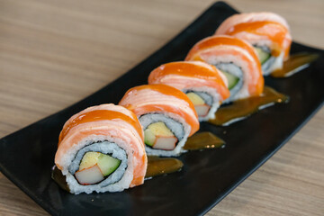 Salmon Sushi roll on plate