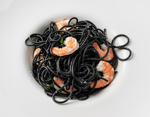 Black Spaghetti with Shrimps on White Restaurant Plate