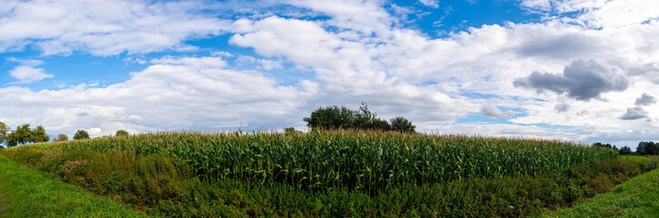 Panorama shot from the fields in northern  Germany on a beautiful cloudy day