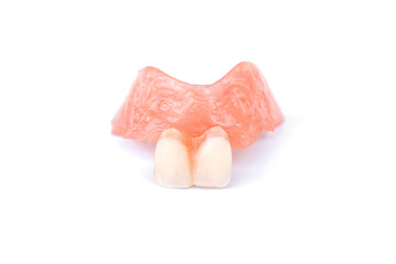 Acrylic dentures isolated on white background. Removable dentures flexible. False teeth.