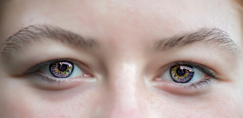 Yellow-blue eyes girl photographed close-up.