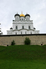 Pskov trinity cathedral inside the kremlin (krom) walls on the green hill