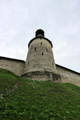 Fototapeta na wymiar The middle tower with wooden roof of Pskov kremlin (krom) medieval fortress, famous landmark of Russia