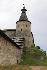 The bonfire tower with wooden roof of Pskov kremlin (krom) medieval fortress, famous landmark of...