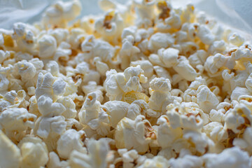 classic salty popcorn close up background, movie food