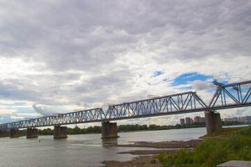 Railway Bridge in Novosibirsk. Railway bridge over the Great Siberian river Ob.