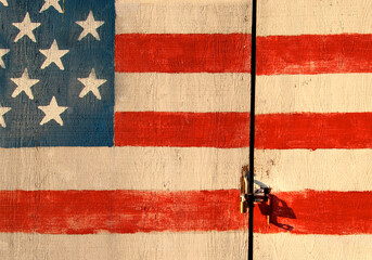 Cropped  American flag on Locked  door a metaphor for current immigration policy