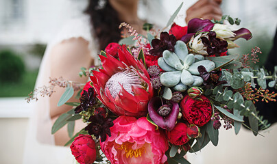 Wedding bouquet of the bride. Floristics, festive decoration of fresh flowers of the ceremony....