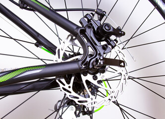 Bicycle wheel: close-up disc brakes, spokes. Cycling, Bicycle Repair Brake Adjustment