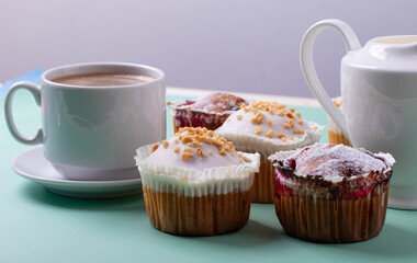 yummy sweet tasty muffin cakes on simple mono color background