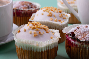 yummy sweet tasty muffin cakes on simple mono color background