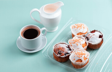 yummy sweet tasty muffin cakes on simple mono color background