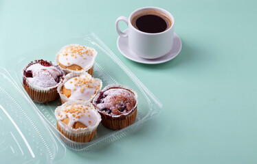 yummy sweet tasty muffin cakes on simple mono color background