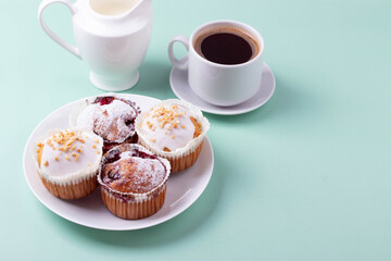 yummy sweet tasty muffin cakes on simple mono color background