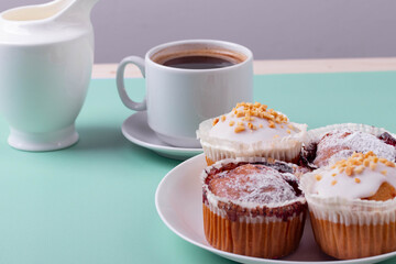 yummy sweet tasty muffin cakes on simple mono color background