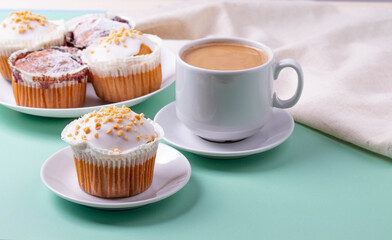 yummy sweet tasty muffin cakes on simple mono color background