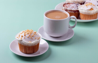 yummy sweet tasty muffin cakes on simple mono color background