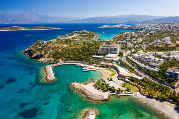 Aerial view of the crystal clear waters of the Cretan sea and Mirabello gulf (Agios Nikolaos, Crete, Greece)