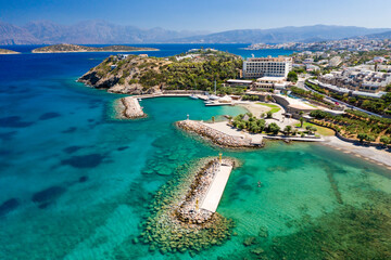 Aerial view of the crystal clear waters of the Cretan sea and Mirabello gulf (Agios Nikolaos, Crete, Greece)