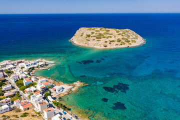 Aerial view of the picturesque village of Mochlos and ancient Minoan ruins on an island (Mochlos, Crete, Greece)