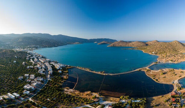 Aerial view of Elounda in Crete showing the sunken remains of the ancient Minoan city of Olous
