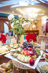 festive tables with red napkins