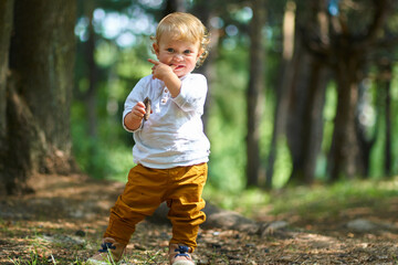 emotional portrait of a child in a white shirt