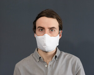 Man with white face mask
