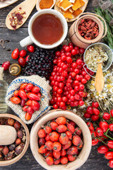 rose hips,chamomile,dog-rose oil  sea buckthorn and goji berries. viburnum branch Medicinal plants and herbs composition	