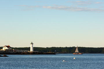 Portsmouth Harbor Lighthouse after sunset. The lighthouse is a historic lighthouse located within...