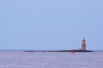 Fototapeta premium Portsmouth Harbor Lighthouse after sunset. The lighthouse is a historic lighthouse located within Fort Constitution in New Castle, New Hampshire, United States.