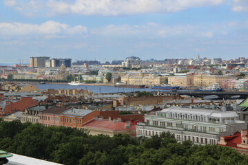 Fototapeta na wymiar Beautiful view of St. Petersburg. Neva river and old colored buildings.