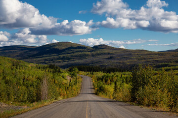 Scenic Road View of Klondike Hwy during a sunny and cloudy day. Taken near Whitehorse, Yukon,...