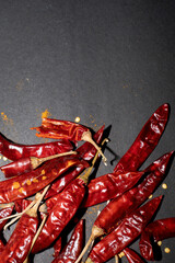 Dried red chili or Dried red peppers on black background
