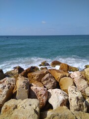 Beautiful view of the stones and the Mediterranean Sea in summer in Israel.