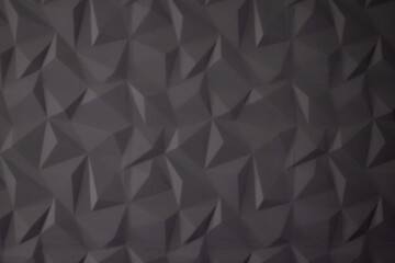 Abstract background of polygons on grey background.