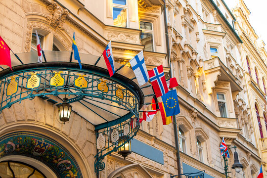 The facade of the old diplomatic building is decorated with flags of different countries