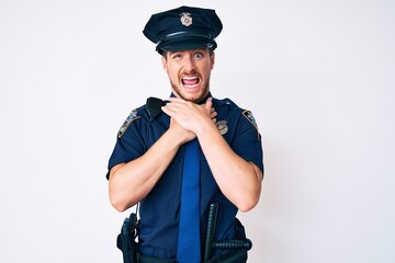 Young caucasian man wearing police uniform shouting suffocate because painful strangle. health problem. asphyxiate and suicide concept.