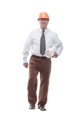 smiling architect striding towards you . isolated on a white