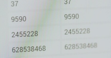 Closeup shot of random status numbers changing on a computer screen.