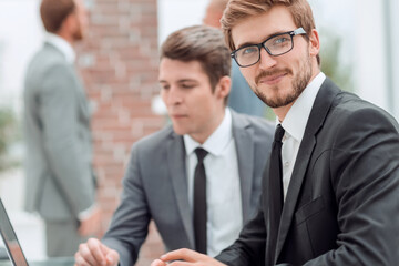 Fototapeta premium business people talk sitting at the office Desk