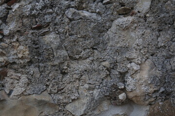 texture di un muro di sassi colorati e cementati