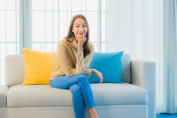 Portrait beautiful young asian woman relax leisure enjoy on sofa