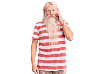 Old senior man with grey hair and long beard wearing striped tshirt mouth and lips shut as zip with...